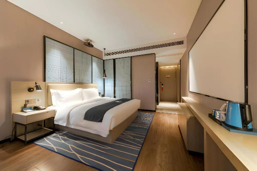 Bed in Echarm Hotel Wuhan Huashan