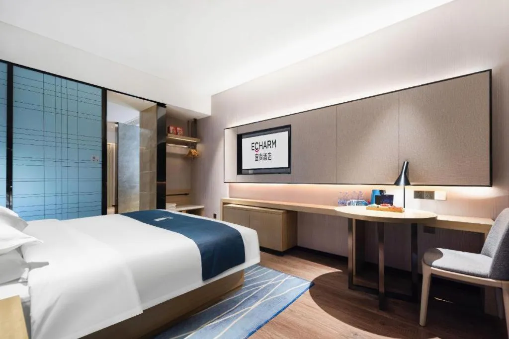 Bed in Echarm Hotel Wuhan Huashan