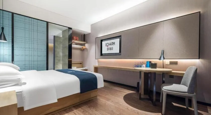Bed in Echarm Hotel Wuhan Huashan