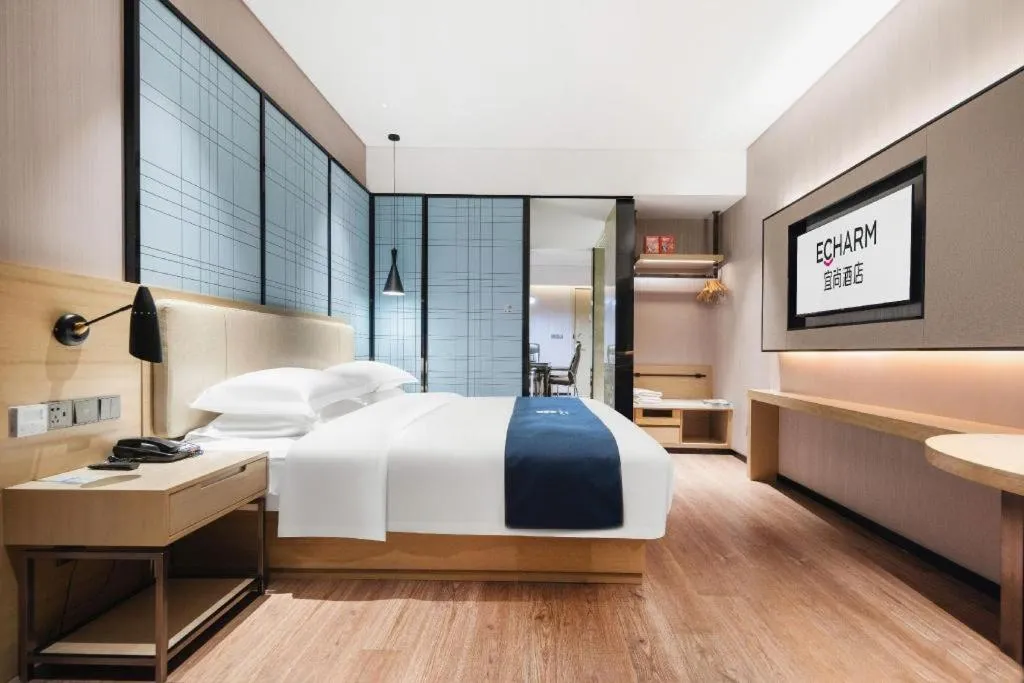 Bed in Echarm Hotel Wuhan Huashan