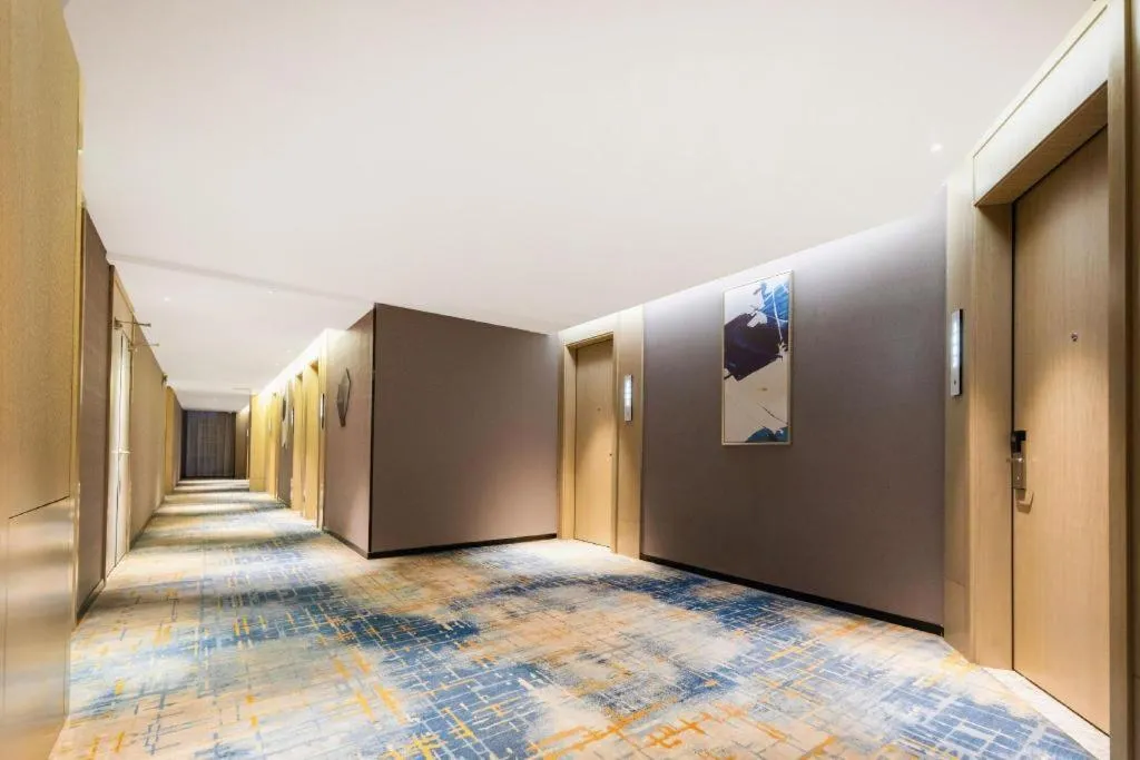 Bed in Echarm Hotel Wuhan Huashan