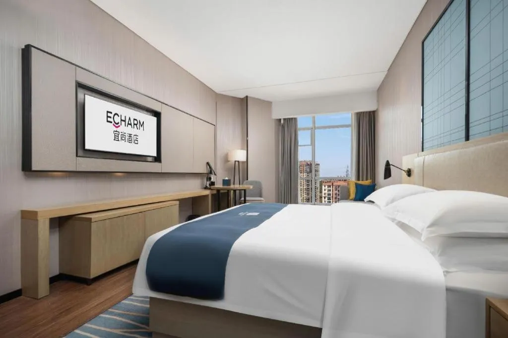 Bed in Echarm Hotel Wuhan Huashan