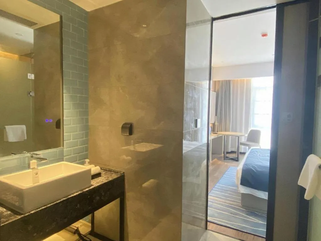 Bed in Echarm Hotel Wuhan Huashan