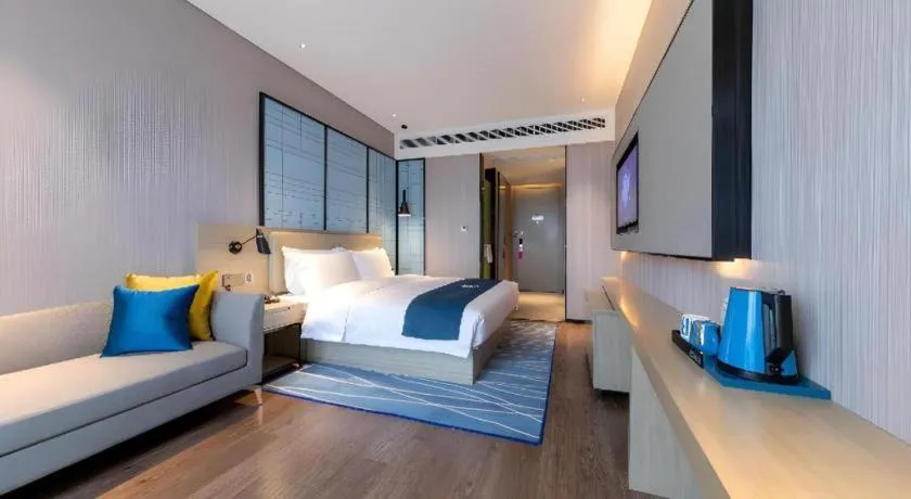 Bed in Echarm Hotel Wuhan Huashan