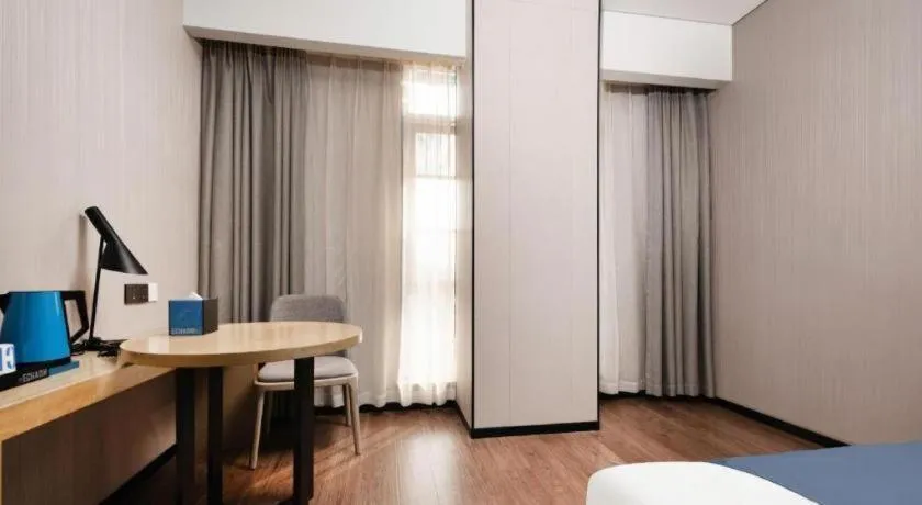 Bed in Echarm Hotel Wuhan Huashan