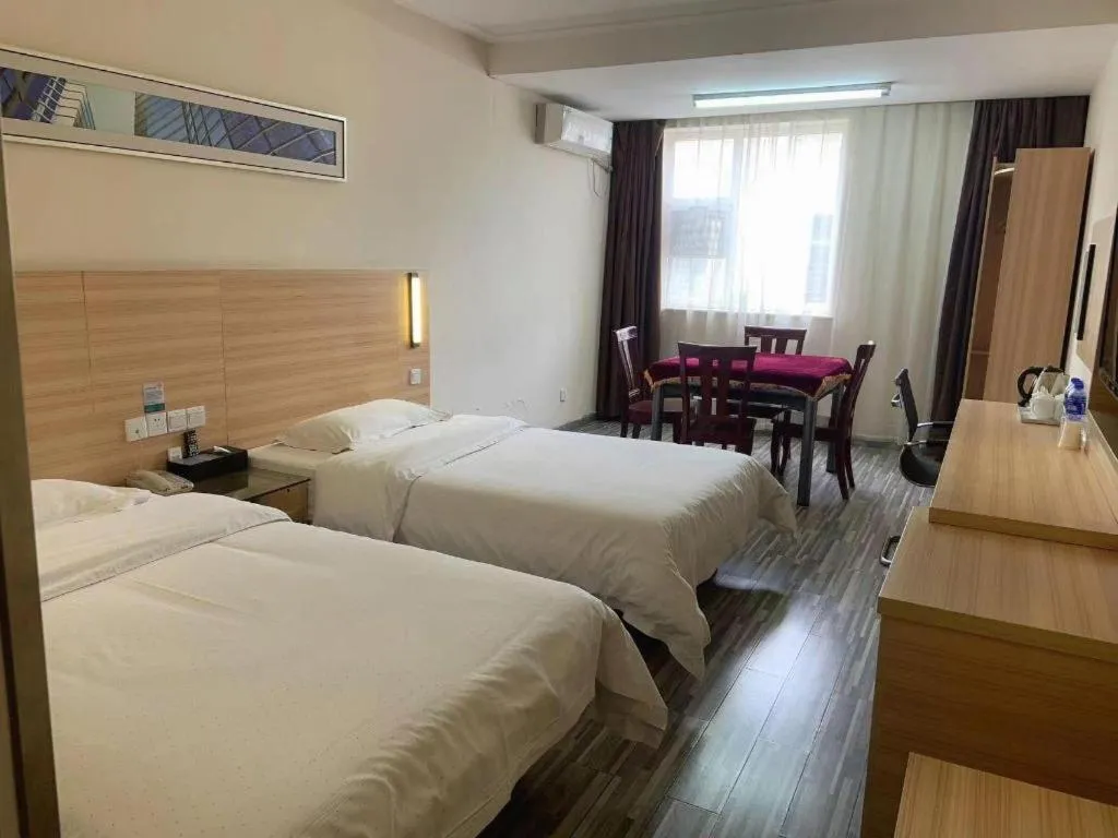 Bed in City Comfort Inn Yichang Wanda Plaza Yunhe Park