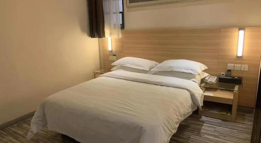 Bed in City Comfort Inn Yichang Wanda Plaza Yunhe Park