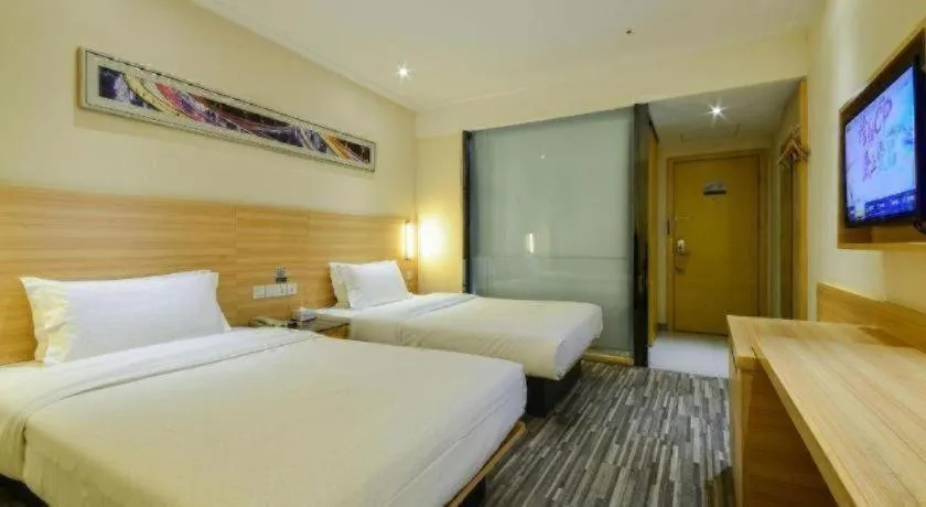 Bed in City Comfort Inn Yichang Wanda Plaza Yunhe Park