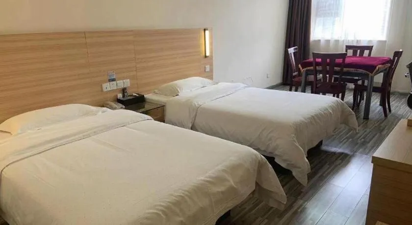 Bed in City Comfort Inn Yichang Wanda Plaza Yunhe Park