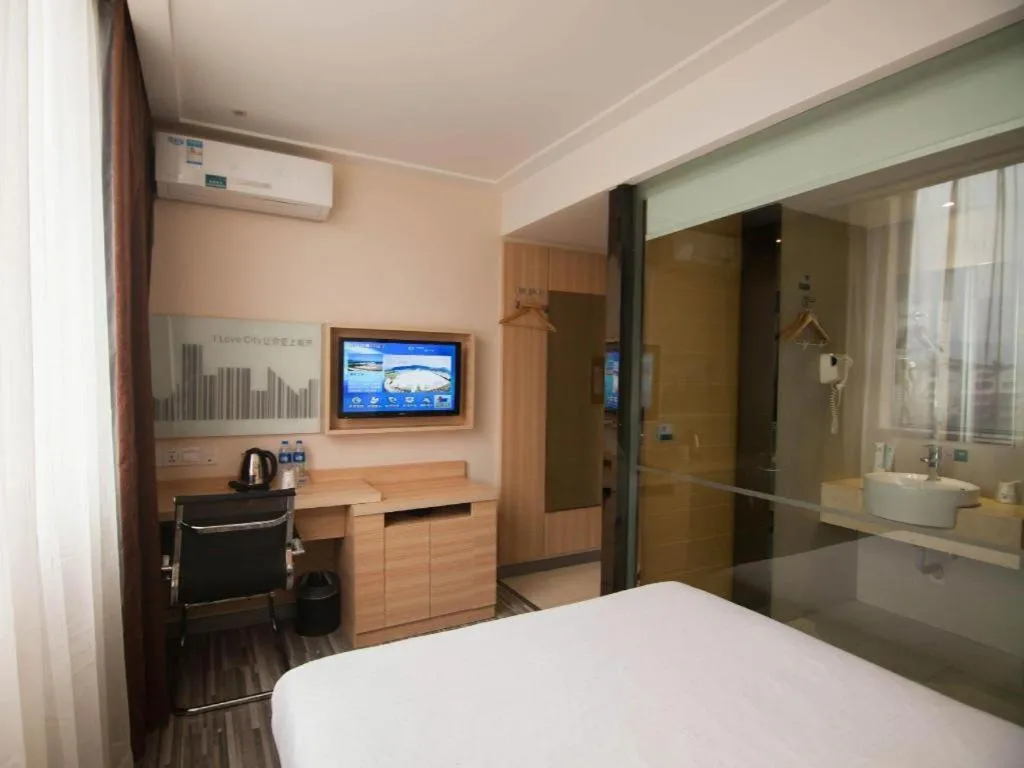 Bed in City Comfort Inn Yichang Wanda Plaza Yunhe Park