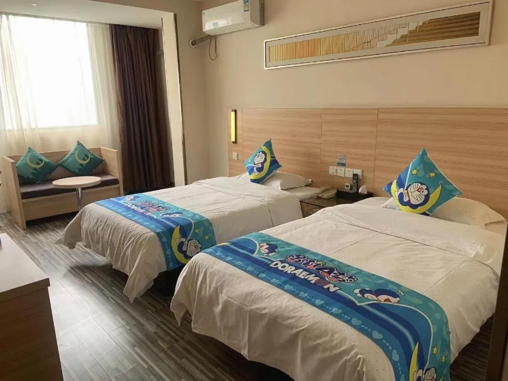 Bed in City Comfort Inn Yichang Wanda Plaza Yunhe Park