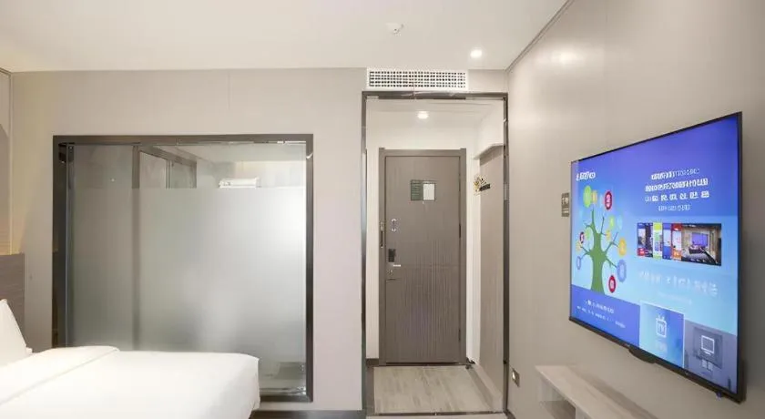 Bed in Borrman Hotel Pingyi Beifang Shicaicheng Mingde Road