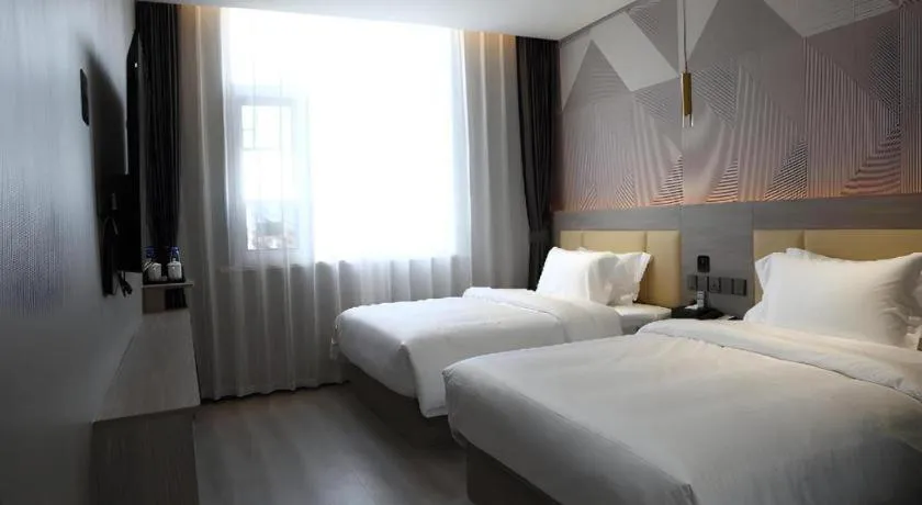 Bed in Borrman Hotel Pingyi Beifang Shicaicheng Mingde Road