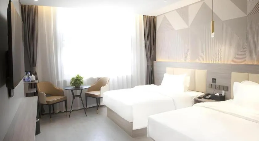 Bed in Borrman Hotel Pingyi Beifang Shicaicheng Mingde Road