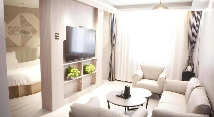 Bed in Borrman Hotel Pingyi Beifang Shicaicheng Mingde Road