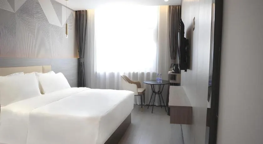 Bed in Borrman Hotel Pingyi Beifang Shicaicheng Mingde Road