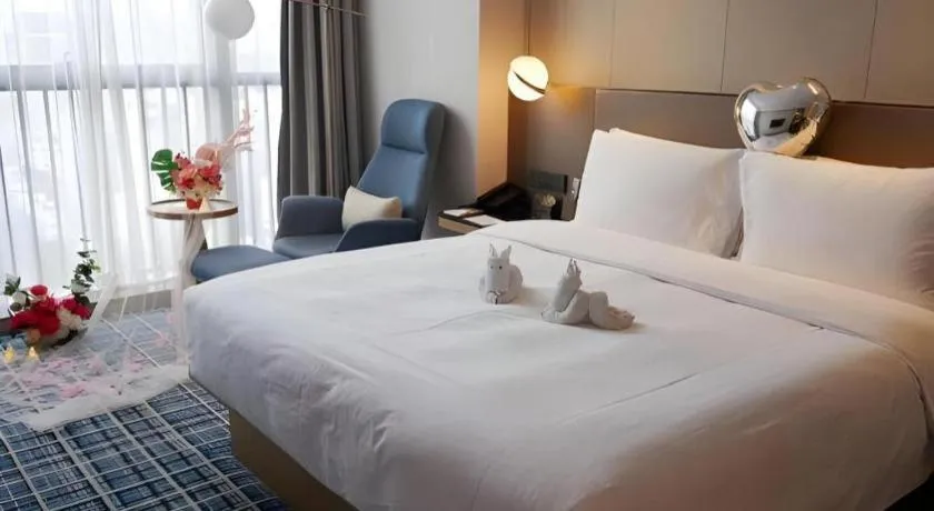 Bed in Onejee Hotel Shenzhen