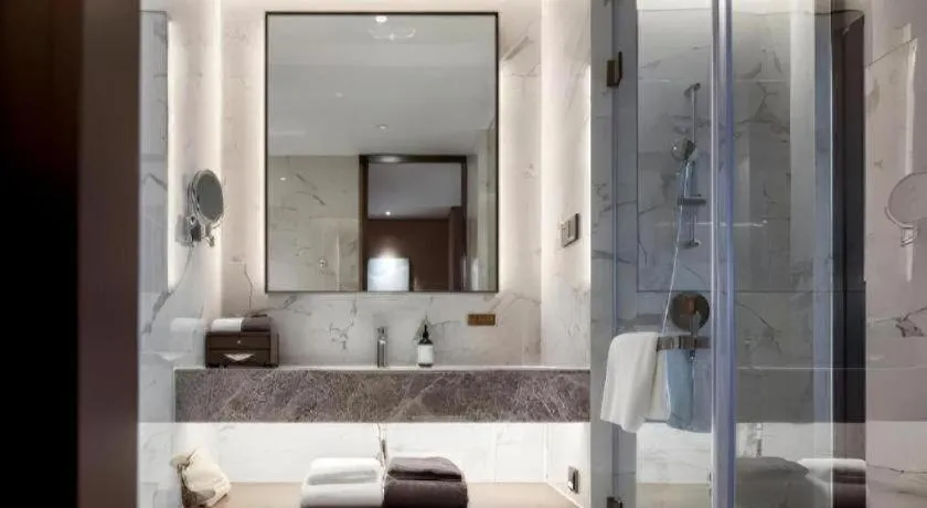 Bed in Onejee Hotel Shenzhen