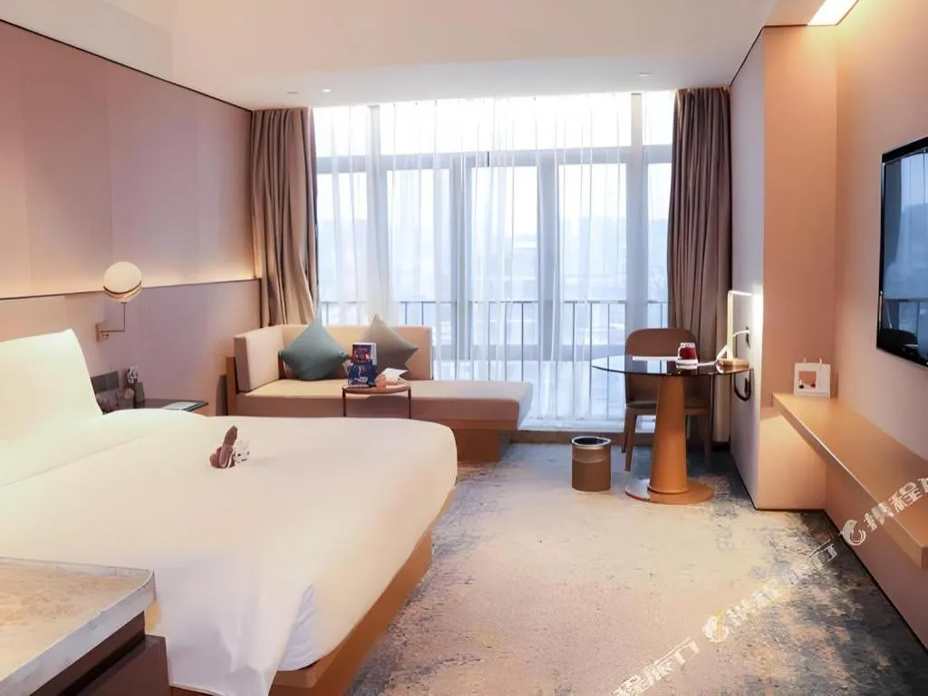 Bed in Onejee Hotel Shenzhen