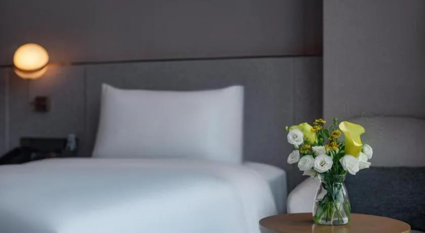 Bed in Onejee Hotel Shenzhen