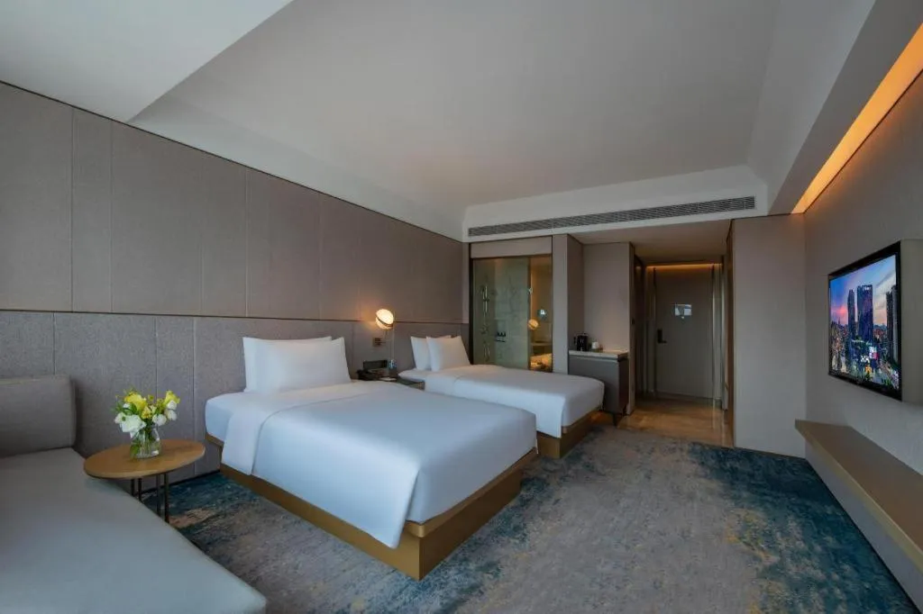 Bed in Onejee Hotel Shenzhen