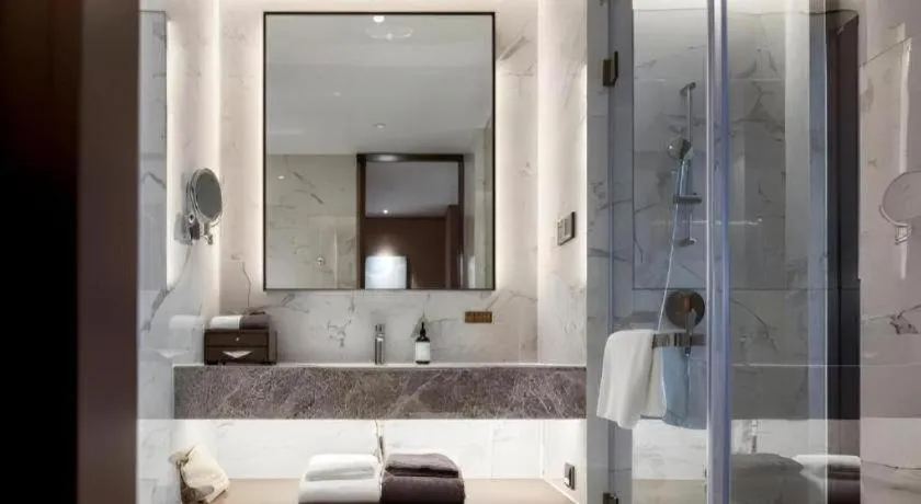 Bed in Onejee Hotel Shenzhen