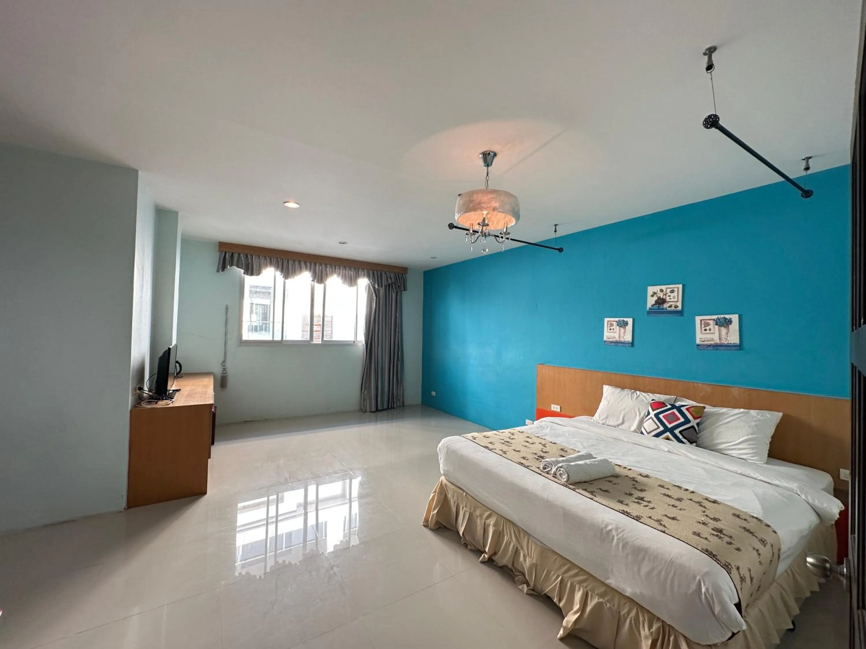 Bed in Sunflower HLD Hotel