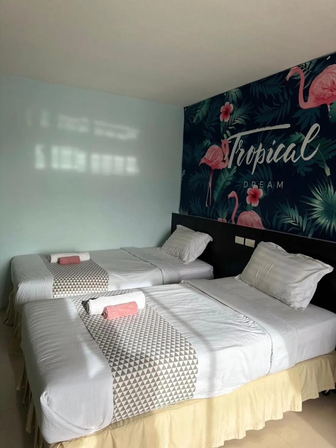 Bed in Sunflower HLD Hotel