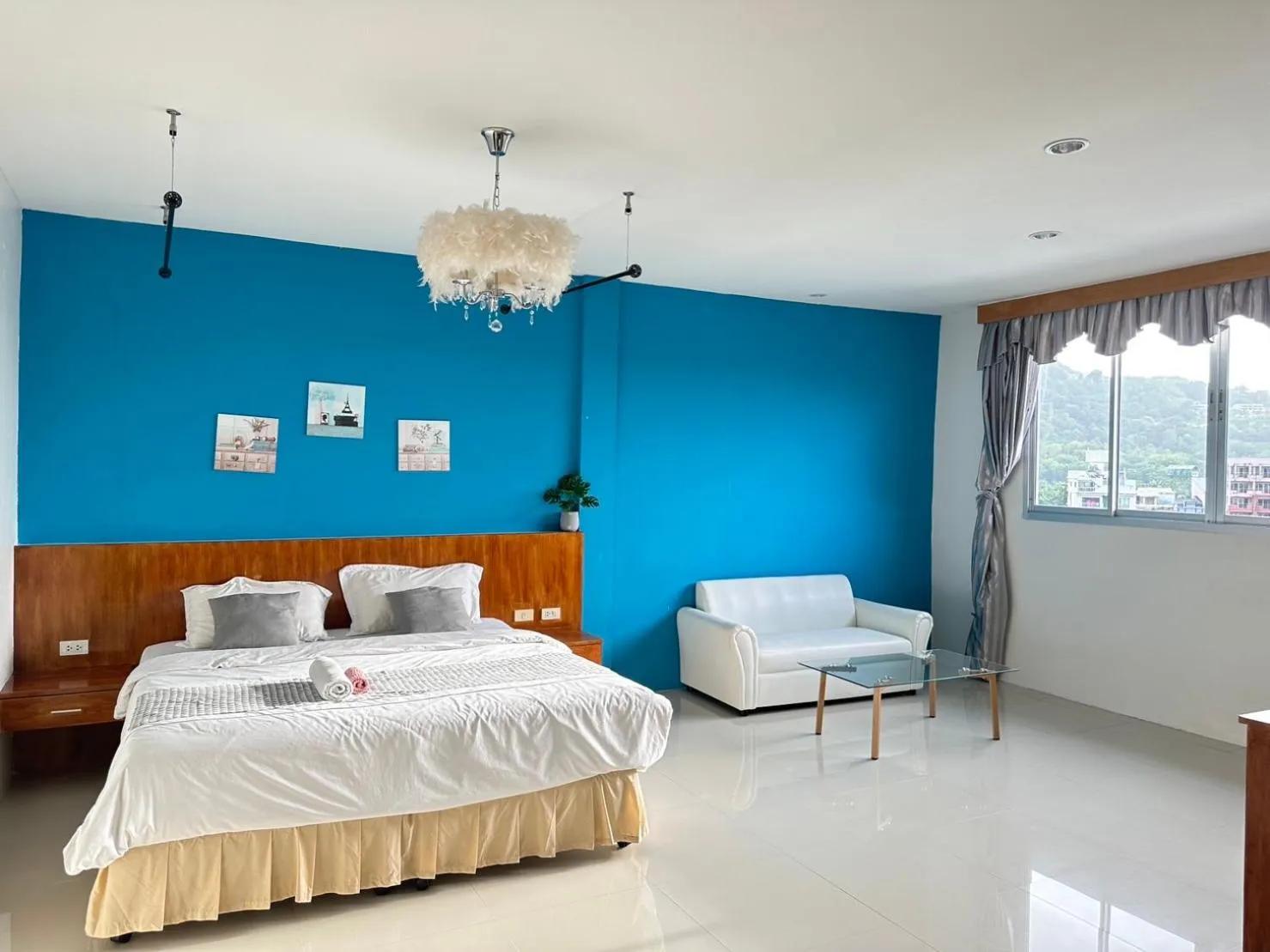 Bed in Sunflower HLD Hotel