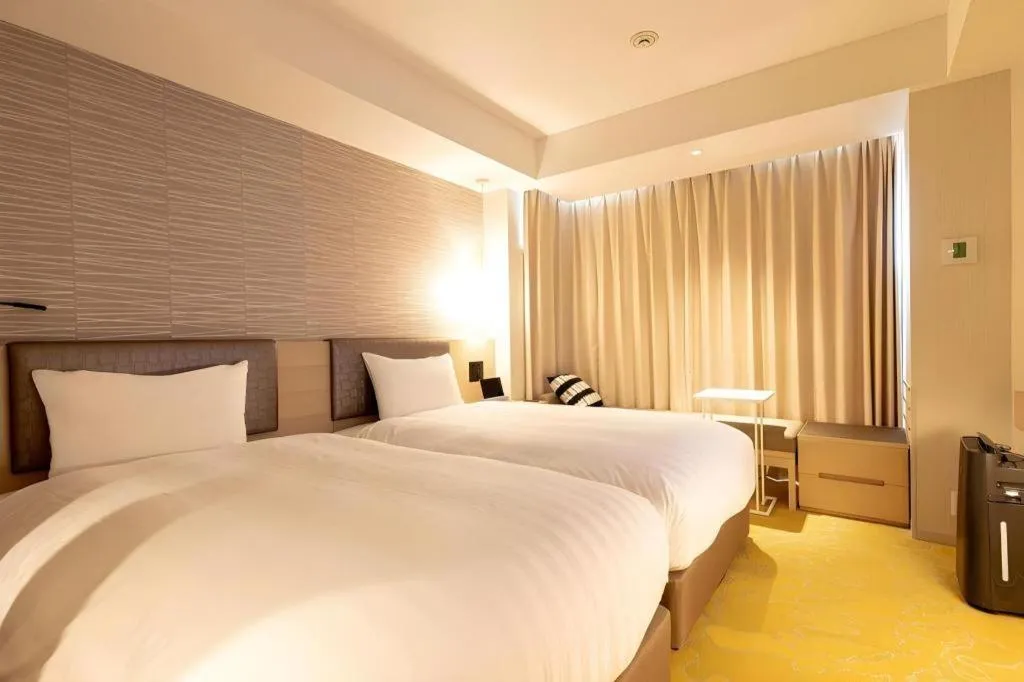 Bed in Montblanc Hotel Raffine Nagoyaekimae