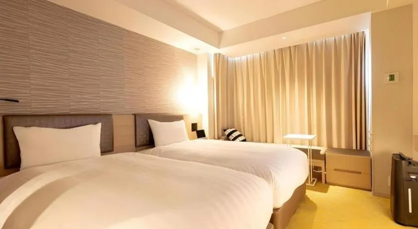 Bed in Montblanc Hotel Raffine Nagoyaekimae