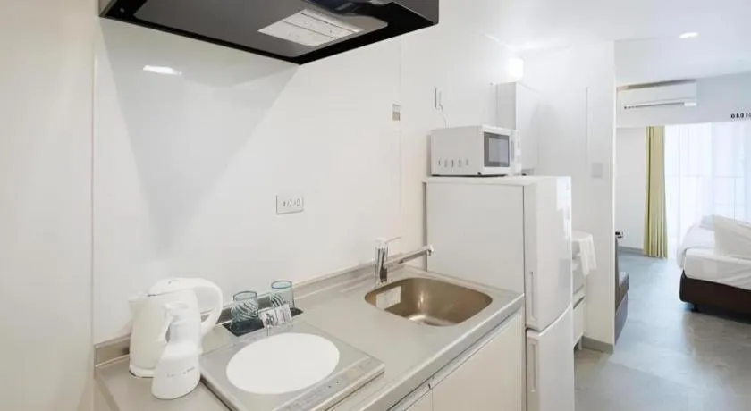 Bed in BIBI hotel kokusaidori