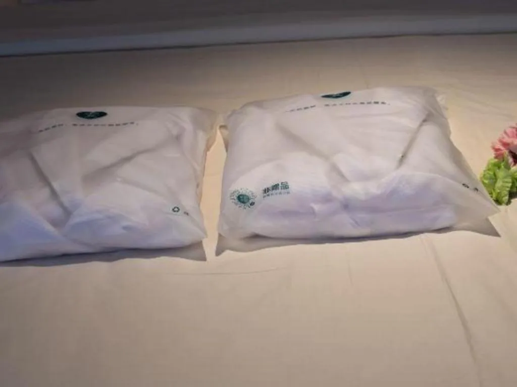 Bed in Atour Hotel Jinan Tangyan Century Avenue