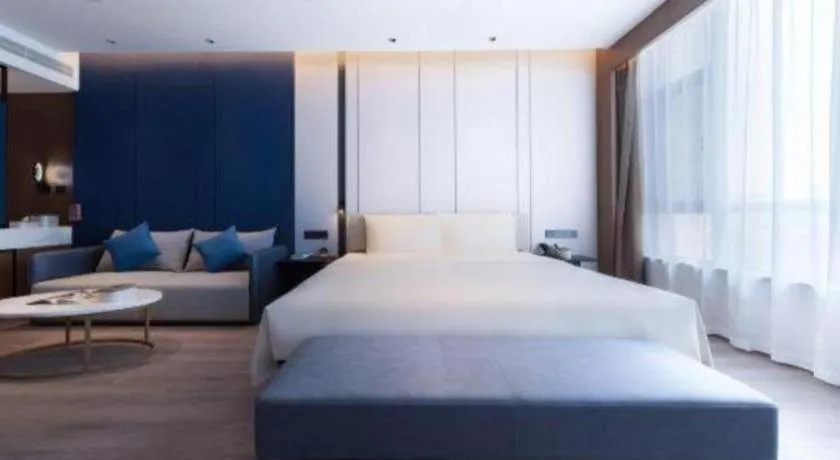 Bed in Atour Hotel Jinan Tangyan Century Avenue