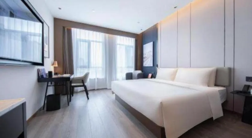 Bed in Atour Hotel Jinan Tangyan Century Avenue
