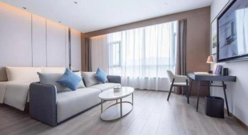Bed in Atour Hotel Jinan Tangyan Century Avenue