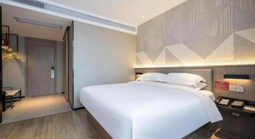 Bed in Borrman Hotel Wuhan Yellow Crane Tower Fuxing Road Metro Station