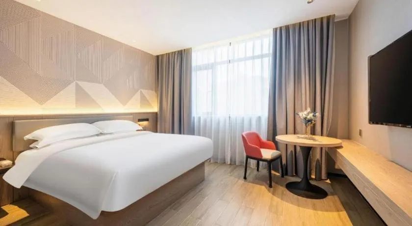 Bed in Borrman Hotel Wuhan Yellow Crane Tower Fuxing Road Metro Station