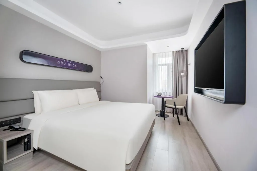 Bed in Atour Light Hotel North Dalian Station Huanan Plaza