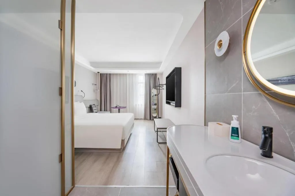 Bed in Atour Light Hotel North Dalian Station Huanan Plaza