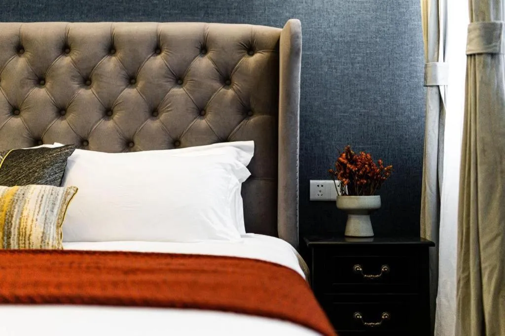 Bed in Origin Antique House and Hotel