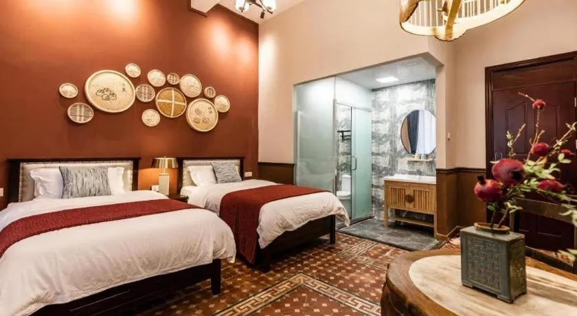 Bed in Origin Antique House and Hotel