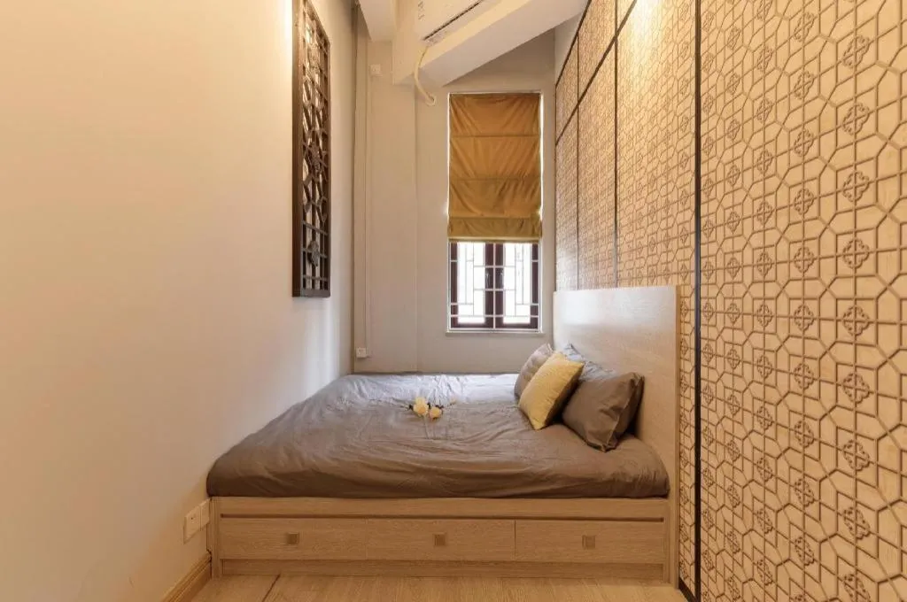 Bed in Origin Antique House and Hotel