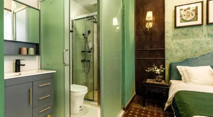 Bed in Origin Antique House and Hotel