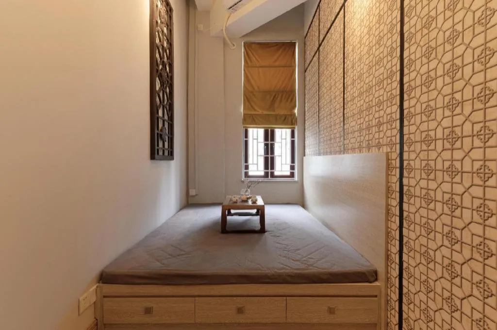 Bed in Origin Antique House and Hotel