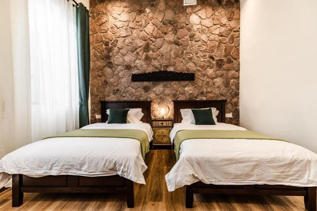 Bed in Origin Antique House and Hotel