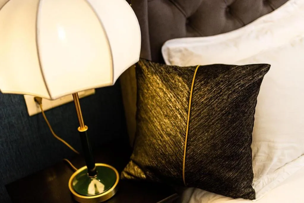 Bed in Origin Antique House and Hotel