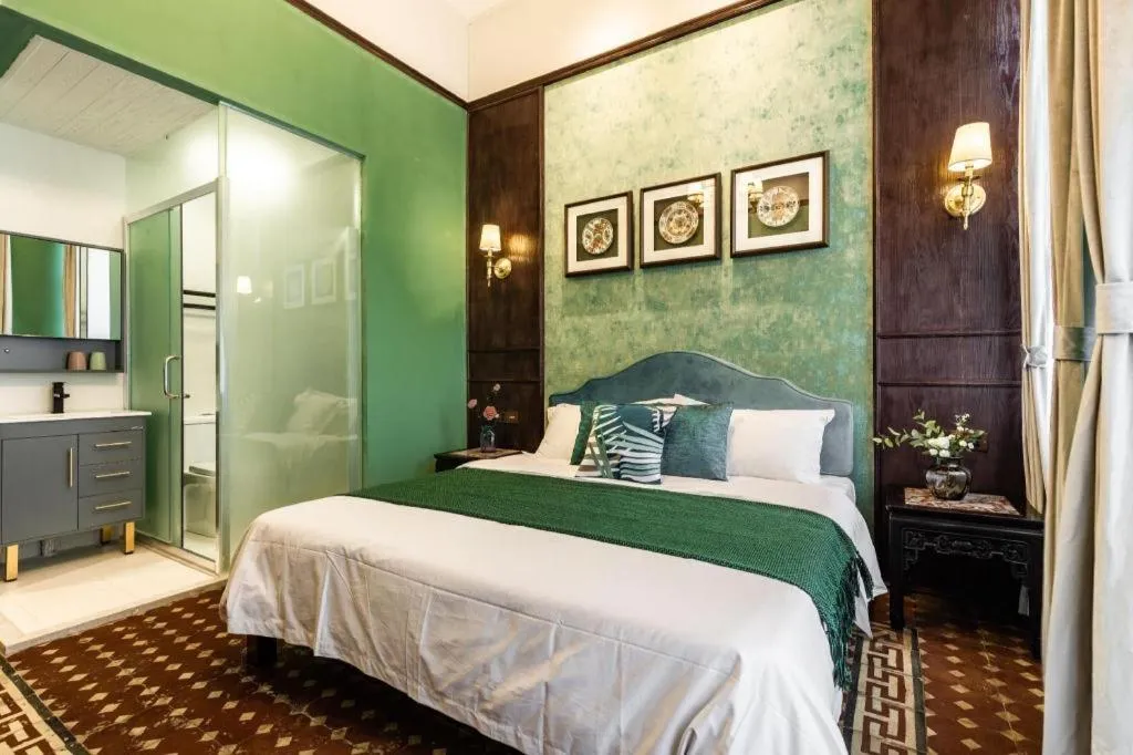 Bed in Origin Antique House and Hotel