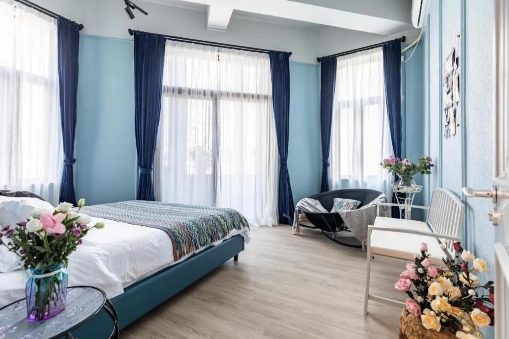 Bed in Origin Antique House and Hotel