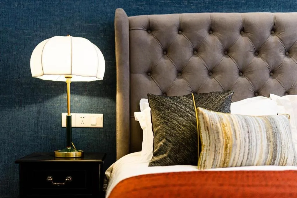 Bed in Origin Antique House and Hotel